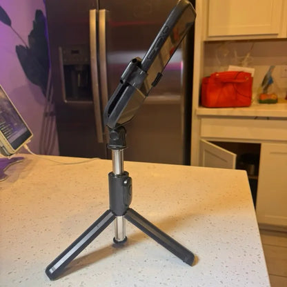 Q07 Remote Control Selfie Stick with Bluetooth Integration - Black Tripod Style Device for Easy Photography